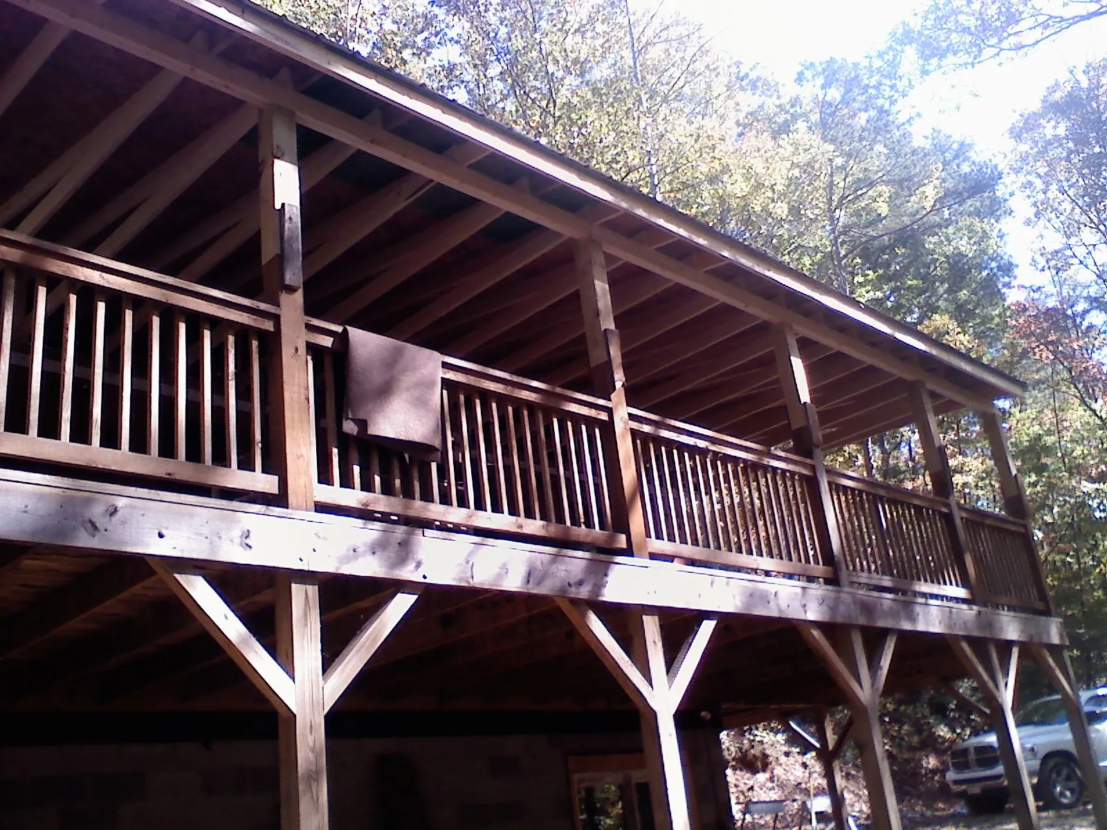 Timber framing under a new elevated porch and deck — Roof Leak Repair in West College Corner by Roofing Brothers